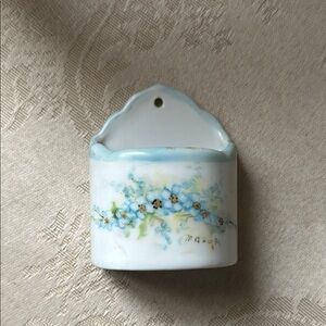 Signed, hand painted porcelain ring holder, wall pocket with blue flowers